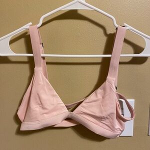 Light pink bikini top with adjustable straps